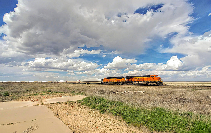 A wind blade train operates near Las Animas, Colorado. A wind blade train operates near Las Animas, Colorado.