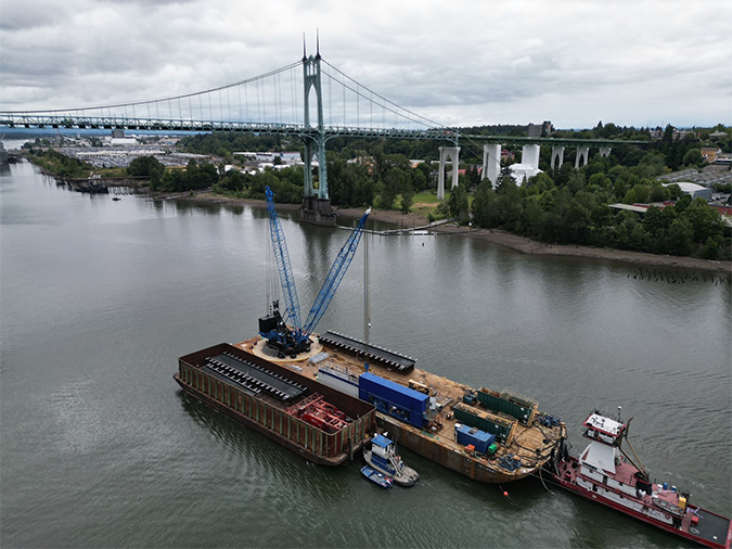 The last of the seven new bridges for the Fallbridge Subdivision replacement project is delivered on the Columbia River. The last of the seven new bridges for the Fallbridge Subdivision replacement project is delivered on the Columbia River.